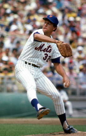 Mets rookie pitcher Dwight Gooden, center, meets with Dennis