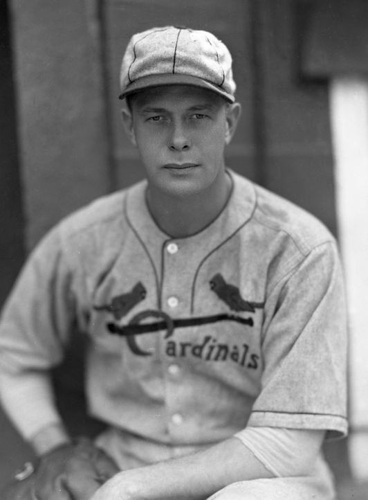 St. Louis Cardinals outfielder Larry Walker pulls his number 33