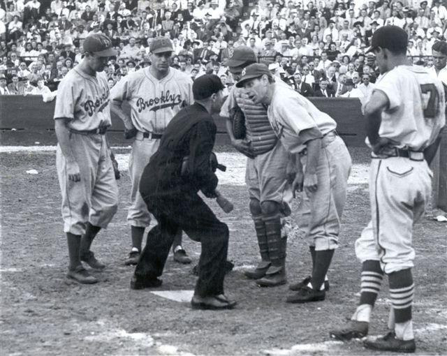 Brooklyn Dodger manager Leo Durocher shakes hands with Jackie Robinson then  with the Dodgers minor league team the Montreal Royals before being called  up to the Major Leagues in 1947 Stock Photo 