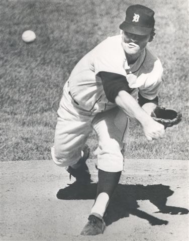 Detroit Tigers ace pitcher Denny McLain shows off a large stuffed