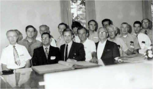 Joe Simenic is front row, fourth from left, in a white shirt.