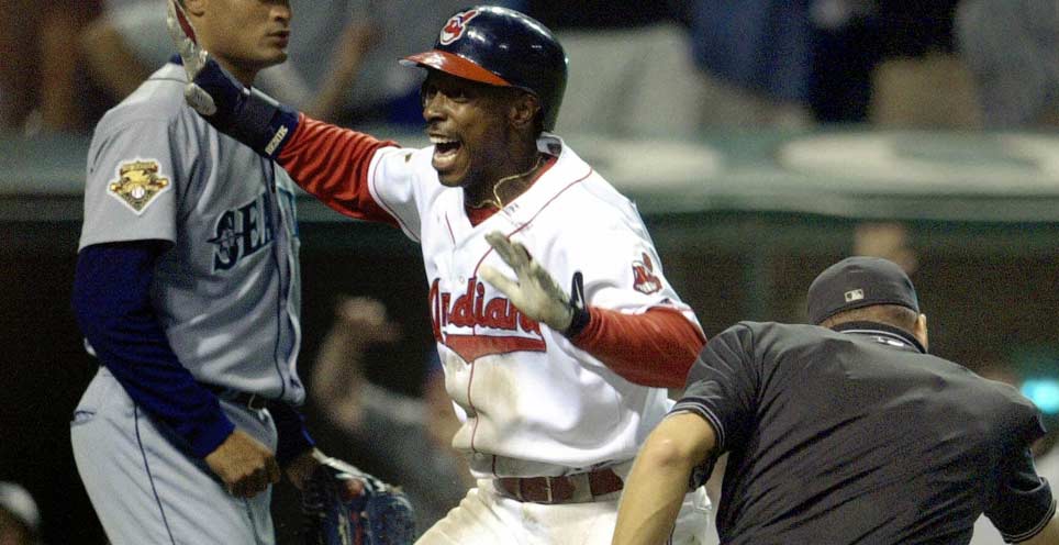 Kenny Lofton scores the winning run in the Cleveland Indians' comeback win over the Seattle Mariners on August 5, 2001 (MLB.COM)