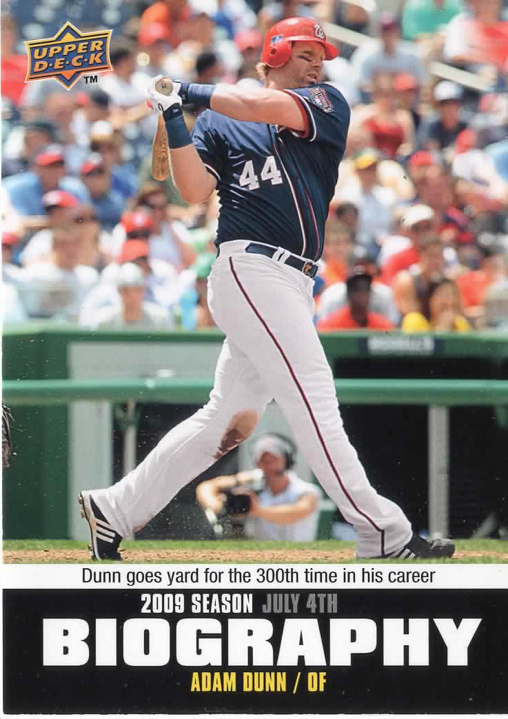 Adam Dunn, a free agent who has signed a $20 million, 2 year contract with  the Washington Nationals, wears his new uniform for the press, with his wife  Rachel and their son Brady, in Washington on February 12, 2009. (UPI  Photo/Alexis C. Glenn Stock