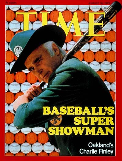 1970s Baseball - 1974: Oakland A's Owner Charlie Finley poses with the core  of his 3-time World Championship club: RP Rollie Fingers, LF Joe Rudi, P  Vida Blue, RF Reggie Jackson, C-1B