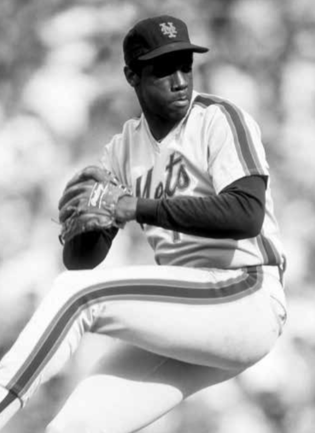 Former New York Mets pitcher Dwight Gooden throws during an Old-Timers'  game before a baseball game between the Colorado Rockies and the New York  Mets on Saturday, Aug. 27, 2022, in New