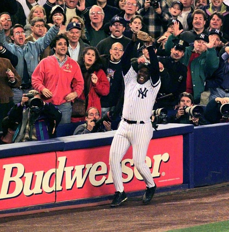 Philadelphia Phillies batter John Kruk throws his batting helmet after