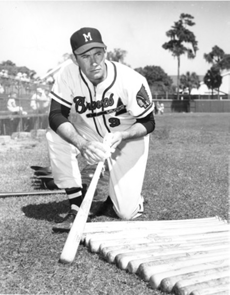 Joe Adcock, Milwaukee Braves' first baseman, holds ball he belted