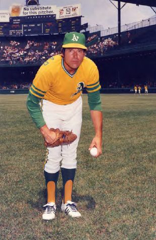 Former Oakland Athletics player John Blue Moon Odom during a ceremony  honoring the Athletics' 1973 World Series championship team before a  baseball game between the Athletics and the New York Mets in