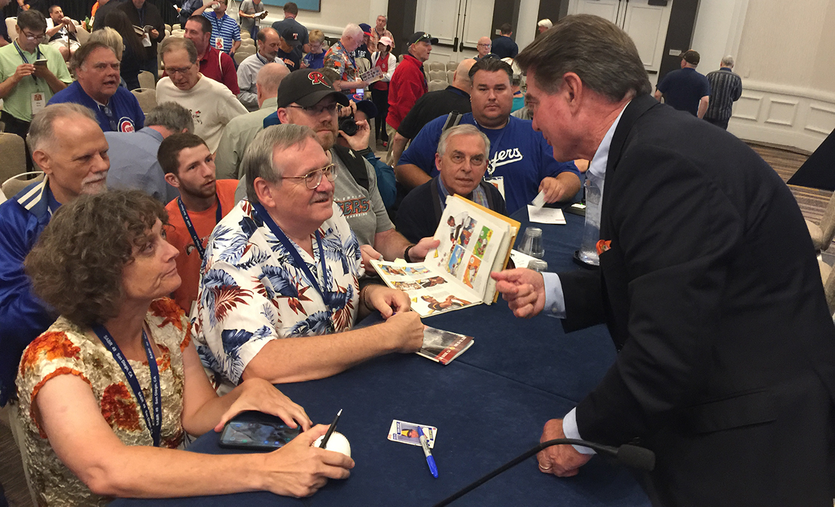 Steve Garvey signs autographs for fans following his SABR Oral History interview.