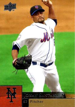 Johan Santana (C), a two-time Cy Young award winner, is joined by his wife  Yasmile and father Jesus as the New York Mets announce the acquisition of  the left-hand pitcher at Shea