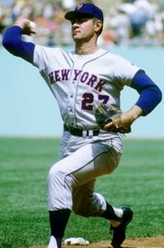 Don Cardwell helps display Ron Swoboda's #4 Jersey. 1969