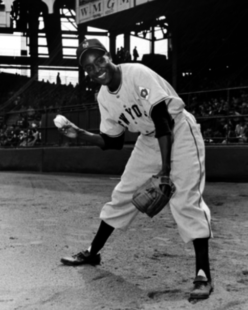 Joe Louis and Satchel Paige meet at Comiskey Park on August 13, 1948