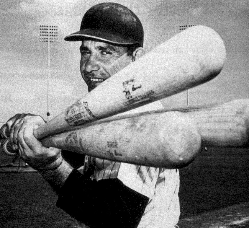 Yogi Berra wearing the 10 World Series rings he won as a player