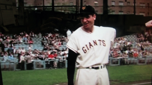 pointing toward the left-field stands at the Polo Grounds on September 29, 1957.