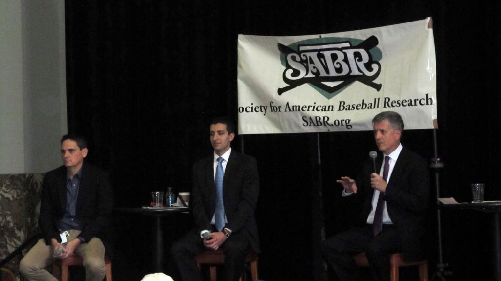 At SABR 44 on August 2, 2014, Houston Astros GM Jeff Luhnow (right), and assistant GMs David Stearns (center) and Sig Mejdal speak before the Astros-Blue Jays game at Minute Maid Park. 