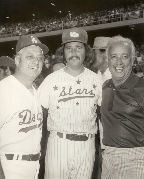 pose before a Hollywood Stars game.