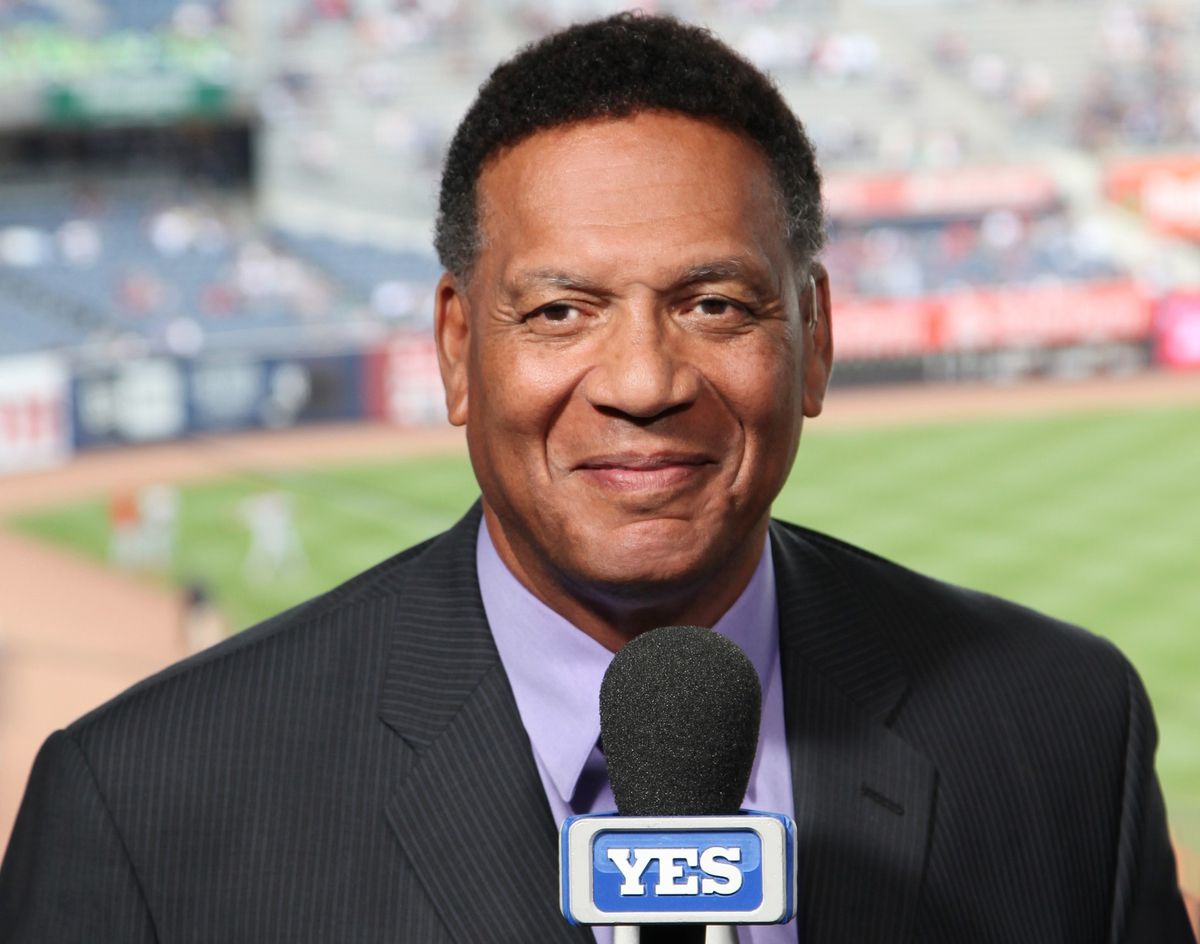 Former Baltimore Orioles players Ken Singleton, left, Rick Dempsey