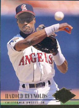 Pat Borders of the California Angels looks on from the dugout